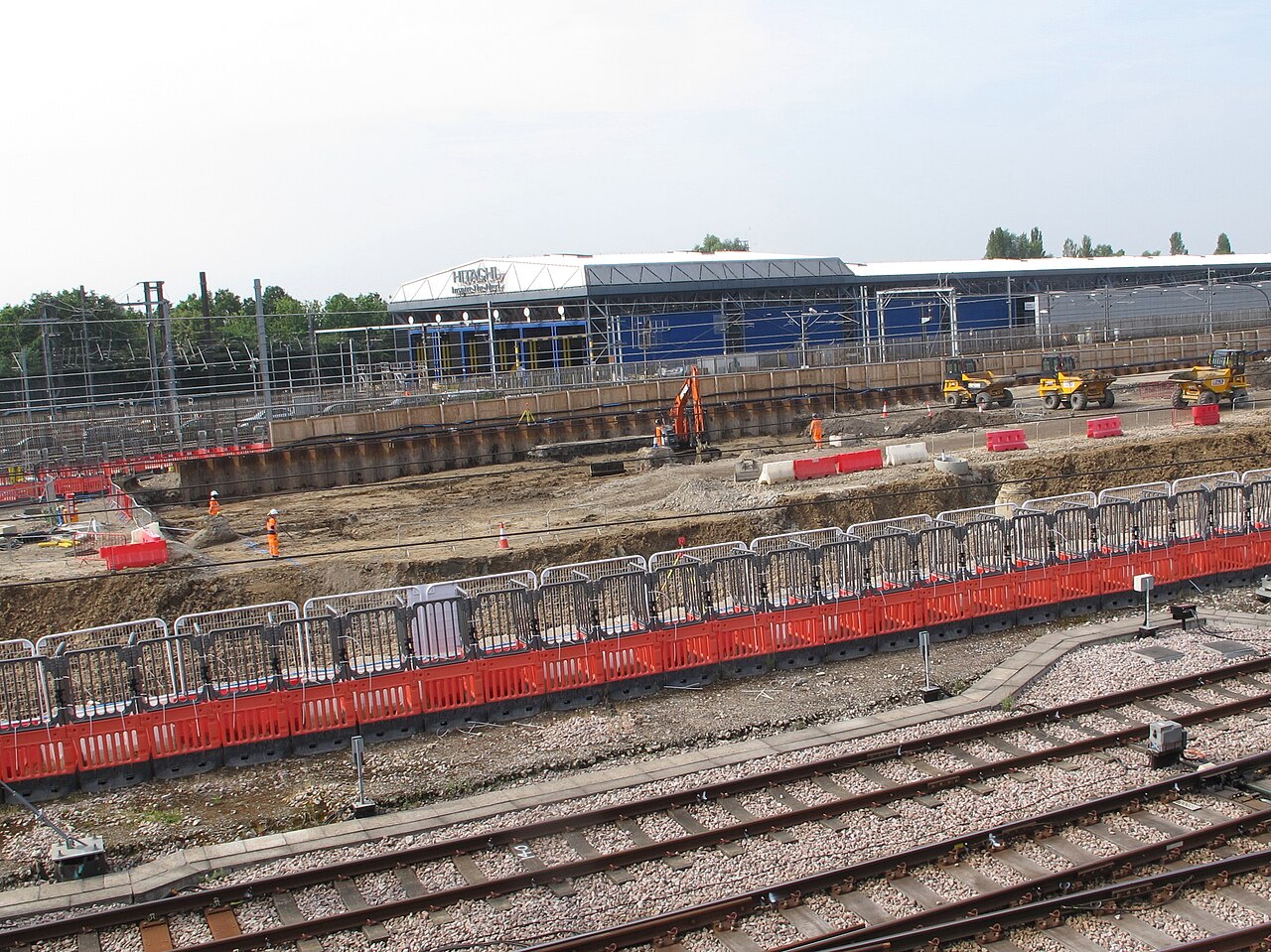 HS2 station construction beside railway tracks at Old Oak Common